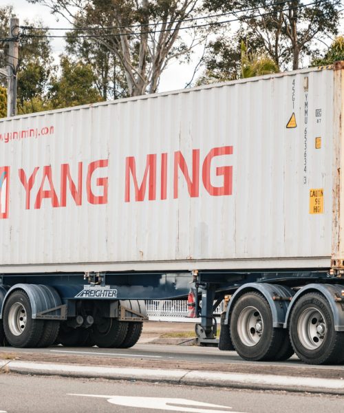 Yang Ming shipping container on a freight truck in Sydney, New South Wales, Australia.